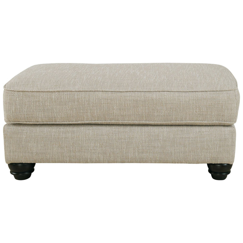 Ashley Asanti Ottoman in Fog-Washburn's Home Furnishings