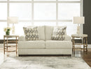 Ashley Caretti Loveseat in Parchment-Washburn's Home Furnishings