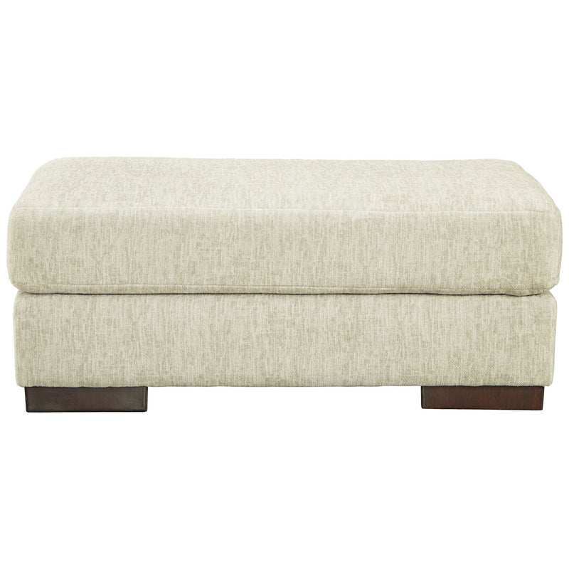 Ashley Caretti Ottoman in Parchment-Washburn's Home Furnishings