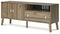 Aprilyn - Honey - Medium Tv Stand-Washburn's Home Furnishings