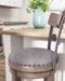 Caitbrook - Gray - Uph Swivel Barstool (1/cn)-Washburn's Home Furnishings