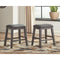 Caitbrook - Gray - Upholstered Stool-Washburn's Home Furnishings