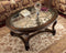 Norcastle - Dark Brown - Oval Cocktail Table-Washburn's Home Furnishings