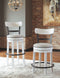 Valebeck - White - Tall Uph Swivel Barstool(1/cn)-Washburn's Home Furnishings